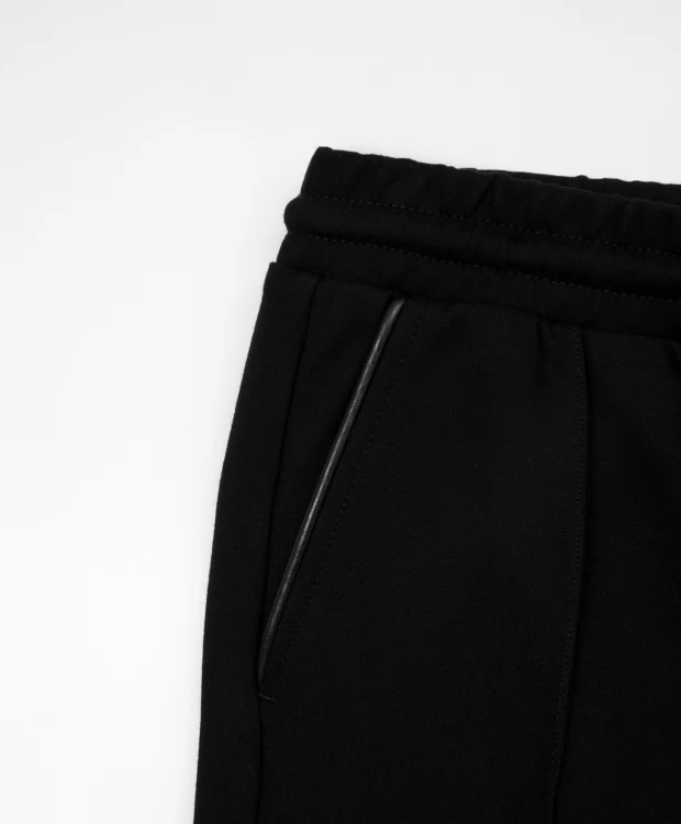 фото Брюки из джерси с поясом на резинке черные gulliver (128)