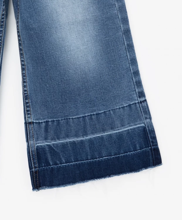 фото Джинсы расклешенные от бедра с потерстостями и заминами голубые gulliver (116)