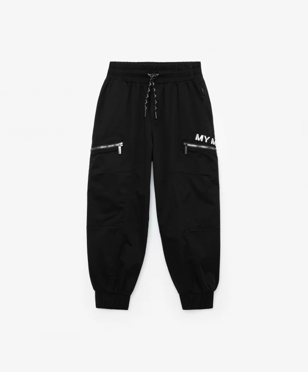 фото Брюки с тесьмой и серебристым принтом черные gulliver (146)