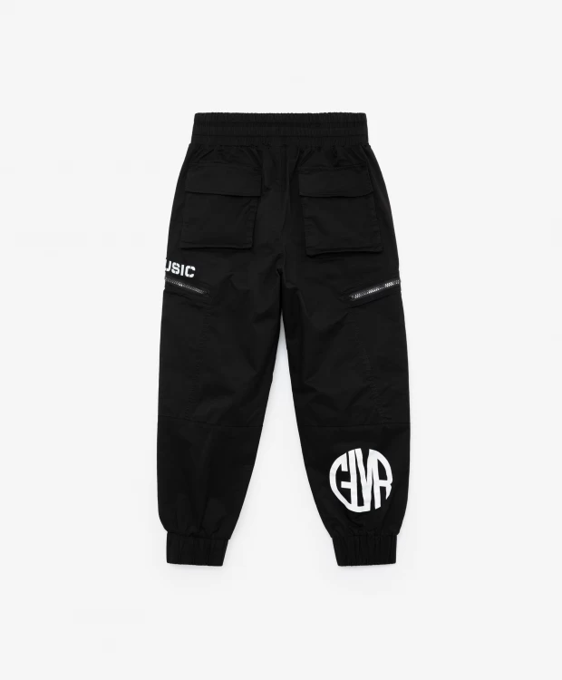 фото Брюки с тесьмой и серебристым принтом черные gulliver (146)