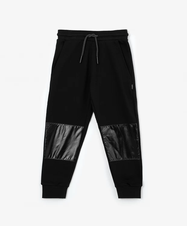 фото Брюки из футера с глянцевыми накладками черные gulliver (128)