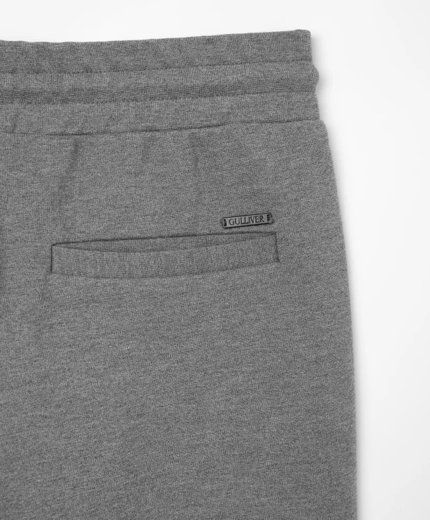 фото Брюки-джоггеры с лампасами серые gulliver (140)