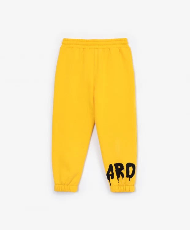 фото Брюки из футера желтые gulliver (134)