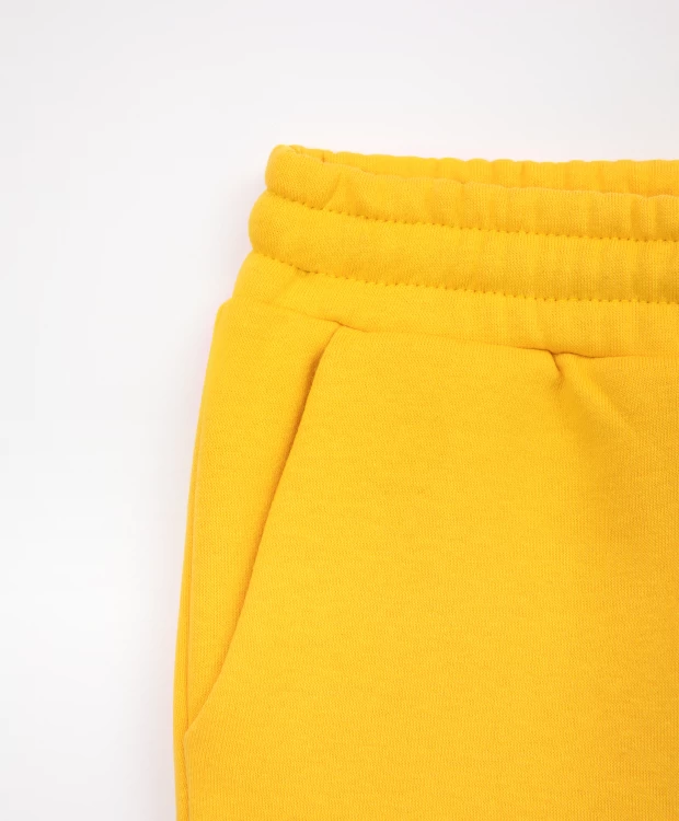фото Брюки из футера желтые gulliver (134)